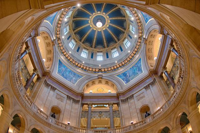 In commemoration of Statehood Day, the Capitol’s electrolier is illuminated high above the Capitol Rotunda Friday, May 11. Photo by David J. Oakes